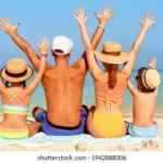 back-view-parents-embracing-children-260nw-1942888306-1